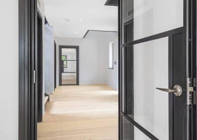 Cedar House Glass Doors and Wooden Floor