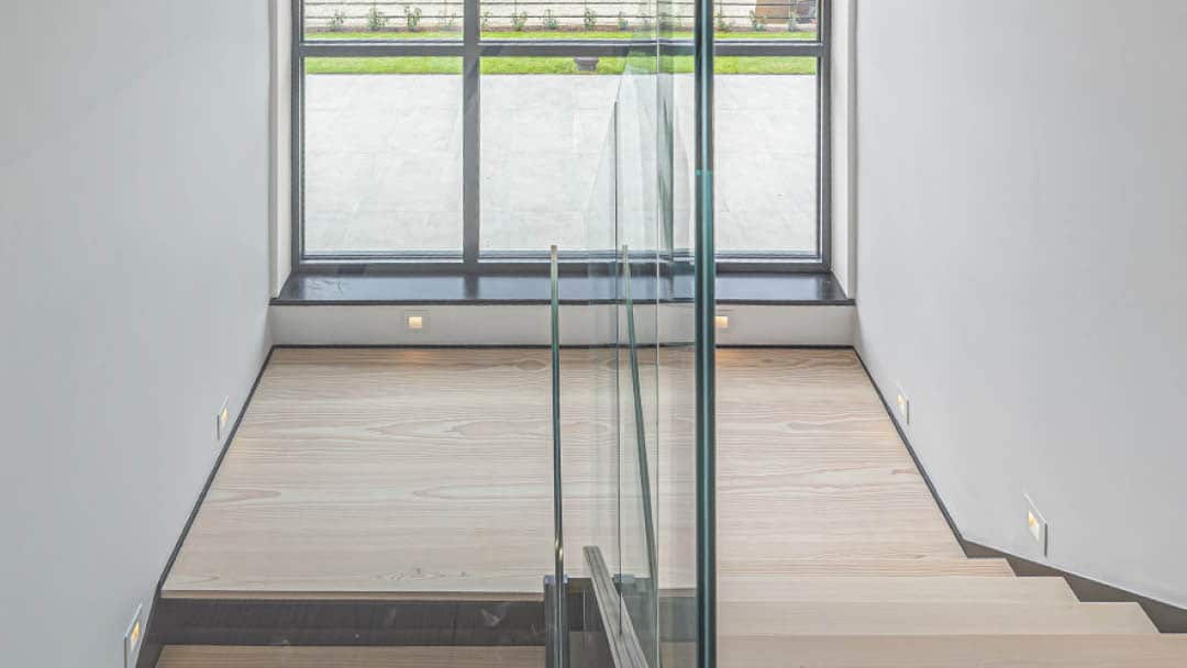 Cedar House Glass Windows Above Stairs